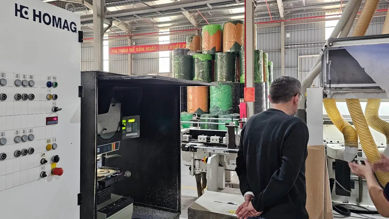 Leadership inspecting Homag machinery for SPC production