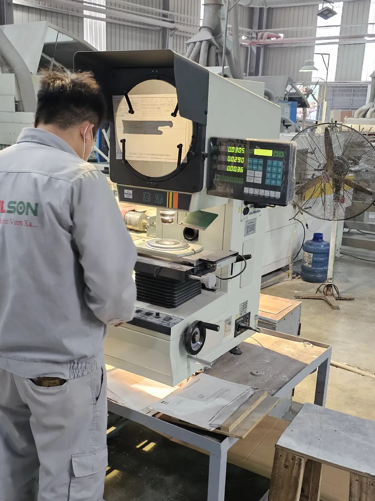 Close‑up of a machine checking the SPC click system for precision